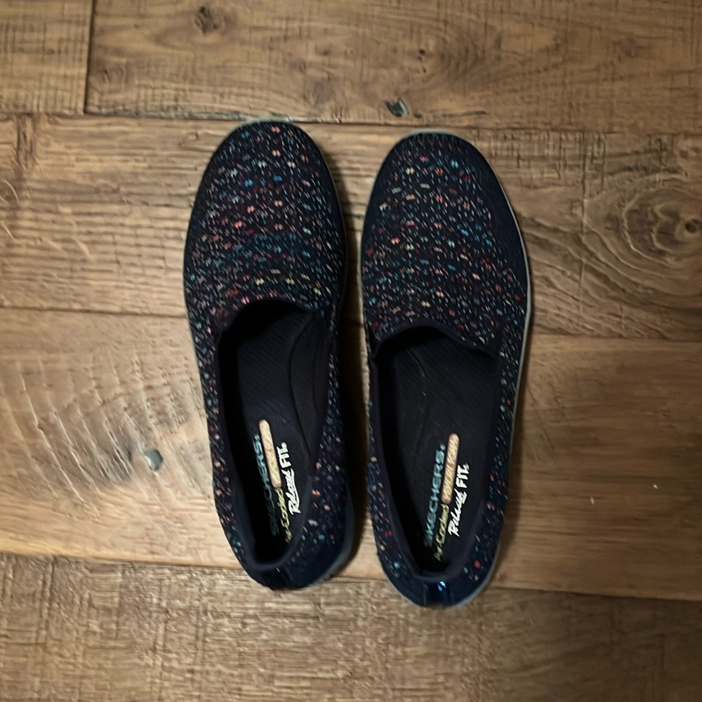Skechers, size9. Cute and comfy.